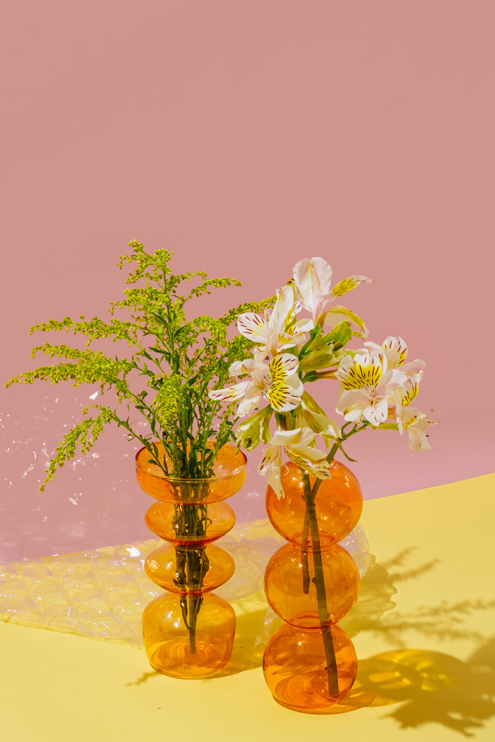 Assorted Flowers in Clear Glass Vases